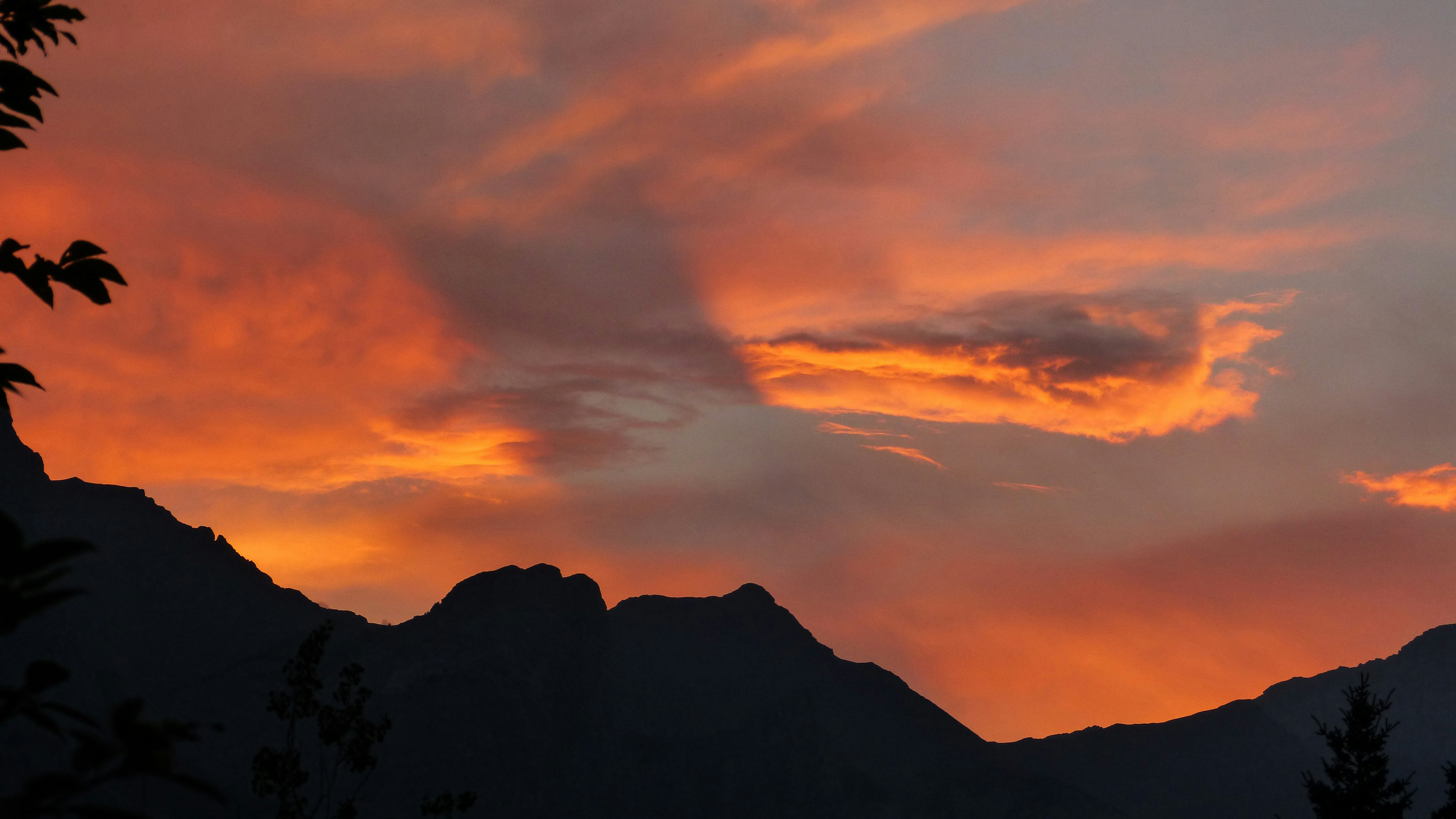 silhouette of mountains during sunset